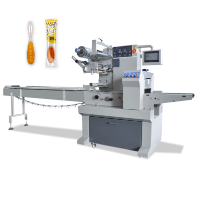 Honey spoon packing machine